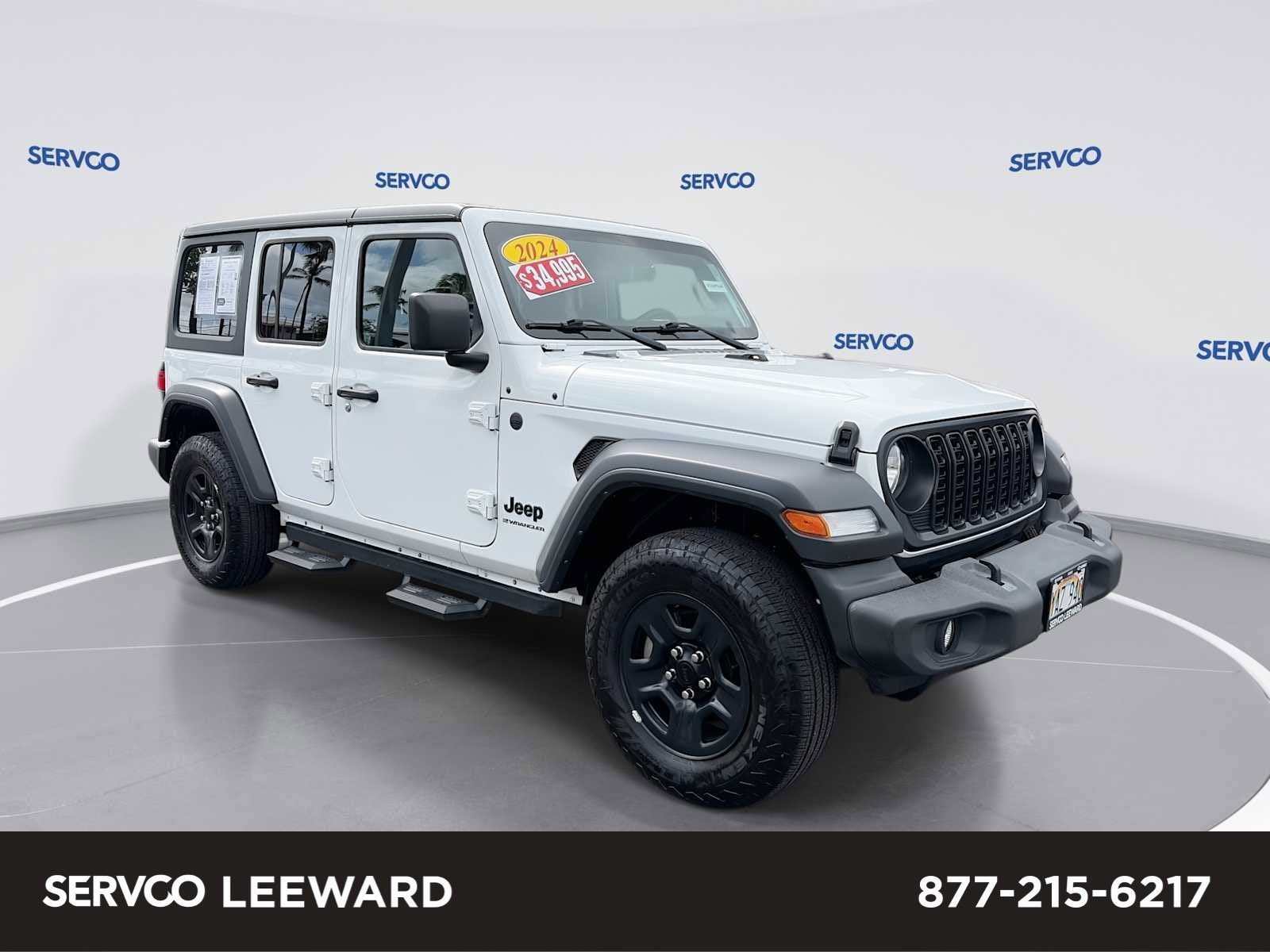 2024 Jeep Wrangler Sport in Bright White Clearcoat — front three-quarter view