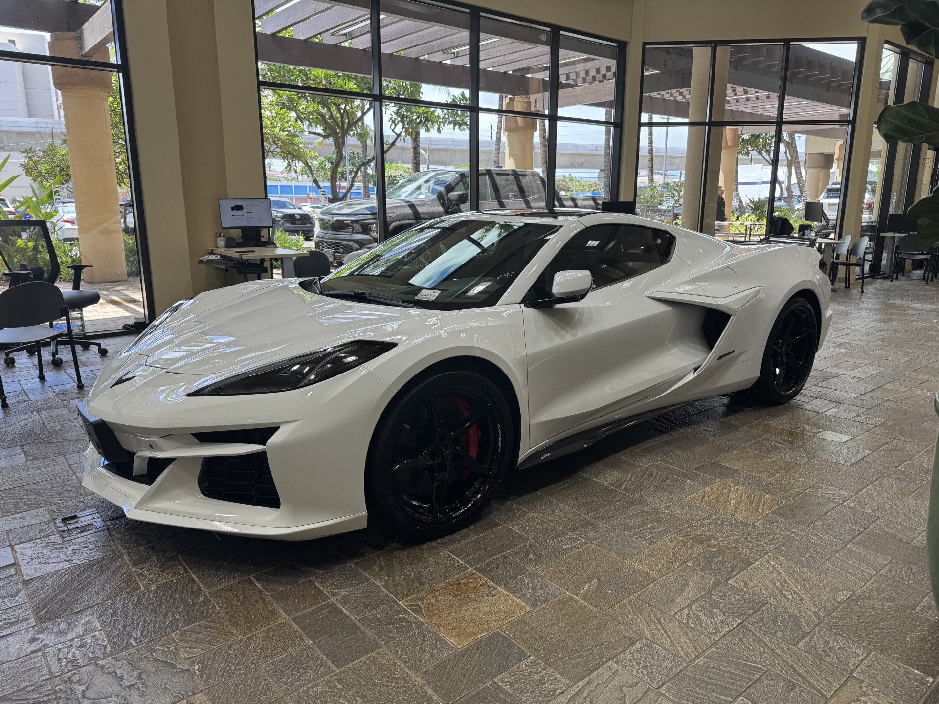 2025 Chevrolet Corvette E-Ray 3LZ in Arctic White — front three-quarter view