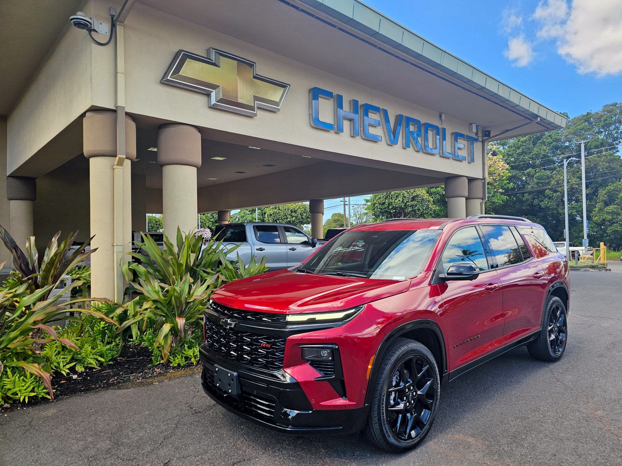 2026 Chevrolet Traverse RS in Radiant Red Tintcoat — front three-quarter view