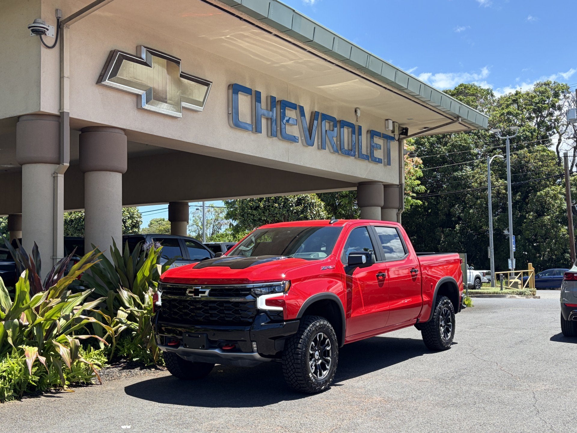 2026 Chevrolet Silverado 1500 ZR2 in Red Hot — front three-quarter view