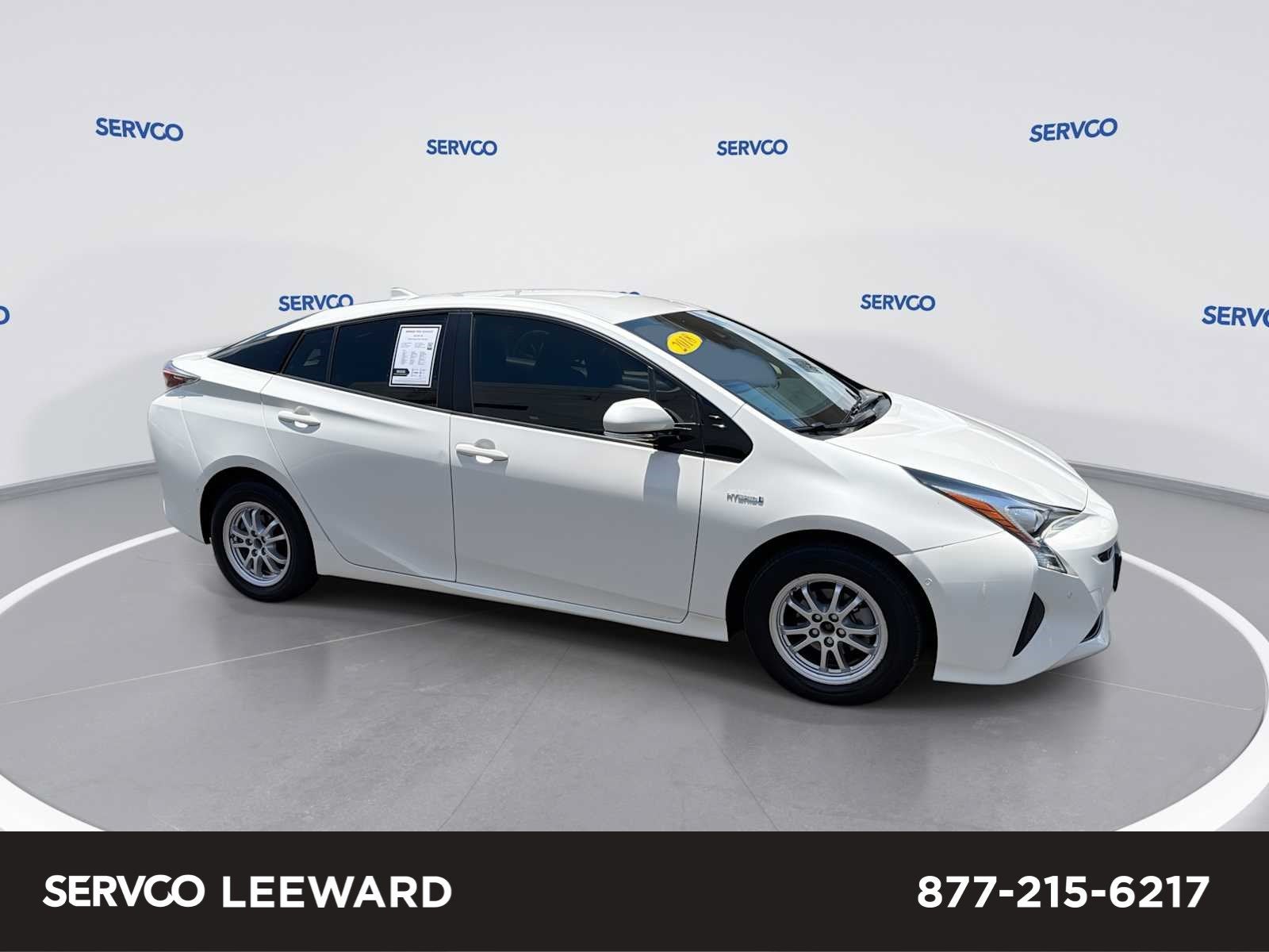 2018 Toyota Prius Two in 070 Blizzard Pearl — front three-quarter view