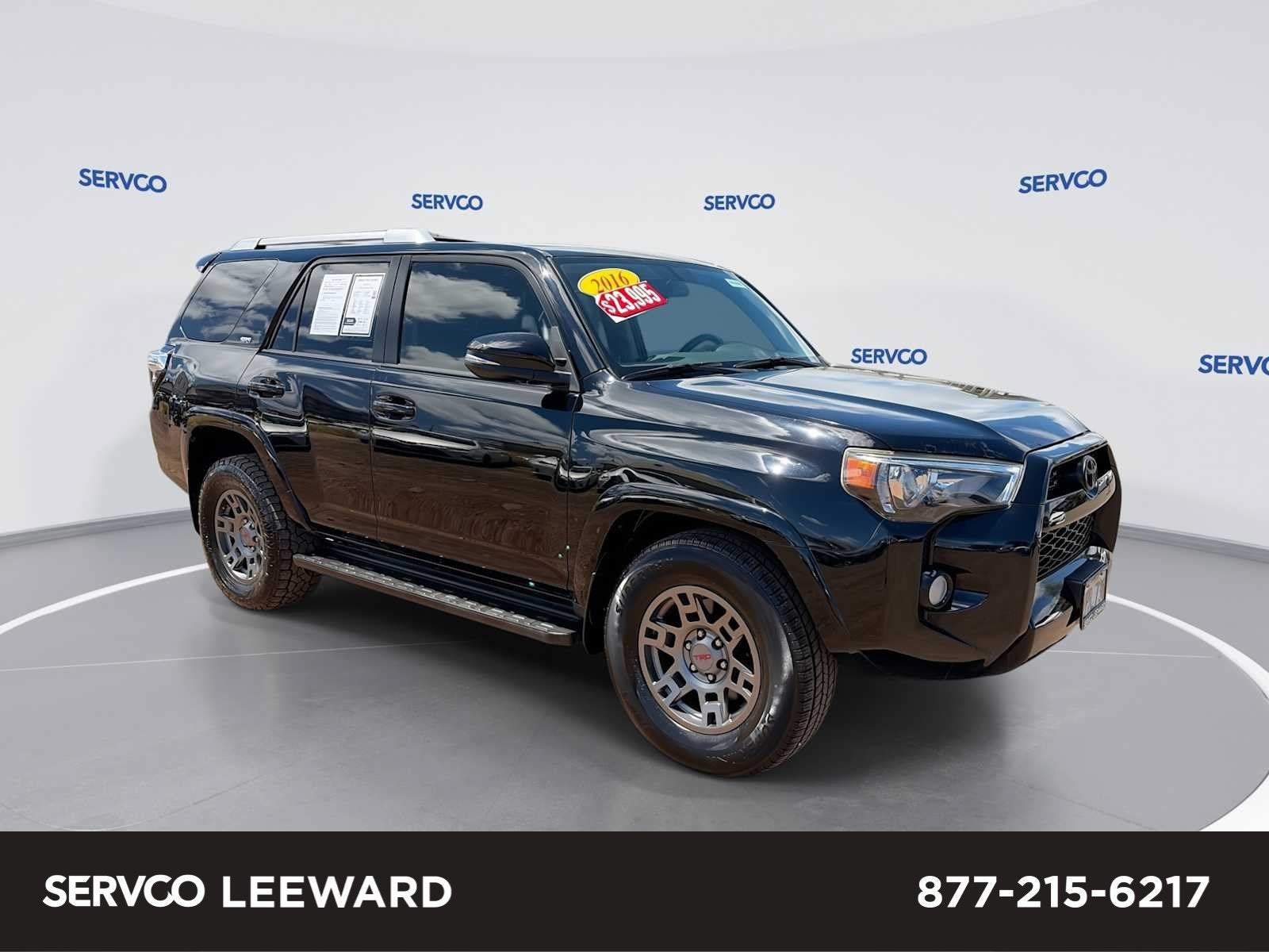2016 Toyota 4Runner SR5 in 218 Midnight Black M — front three-quarter view